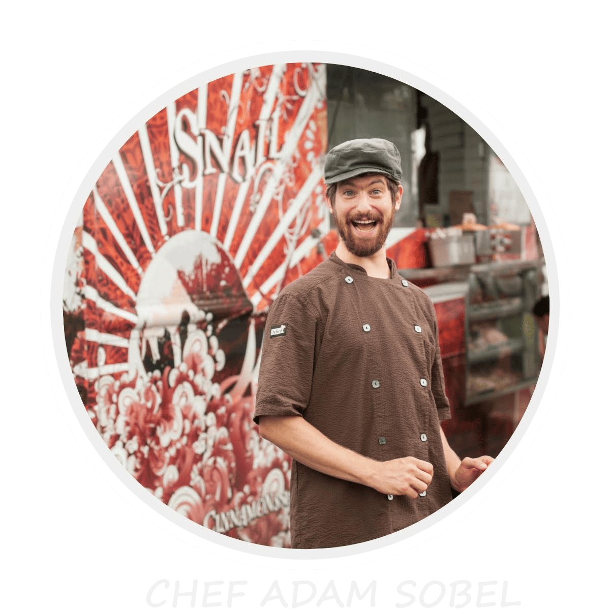 chef adam sobel in front of a food truck.